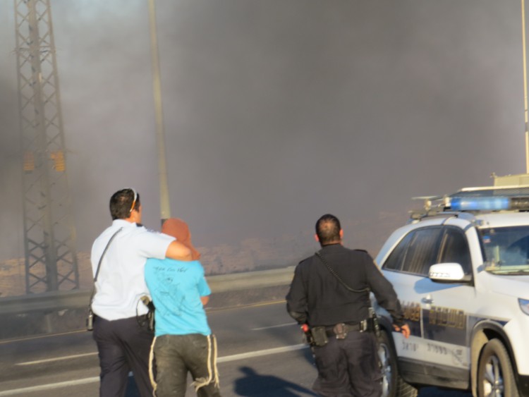 Arrest of protester in Roadblock in Givat Assaf