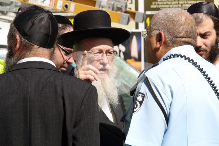 Minister Litzman at the Scene of the Deadly Terror Attack on Malkhei Yisrael St. in Jerualem
