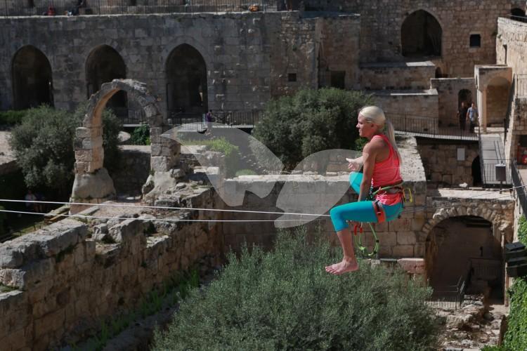 Heather Larsen Slacklining on Tower of David, 2.5.16
