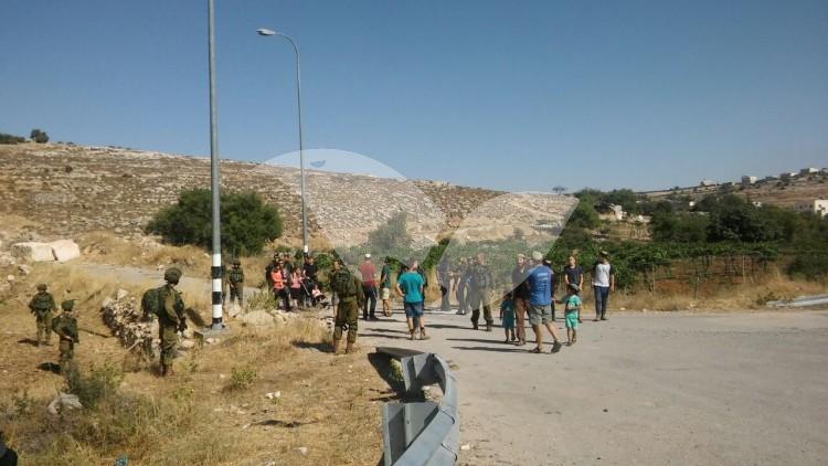 Civilians Block Route 60 to Palestinians Following Terror Attack