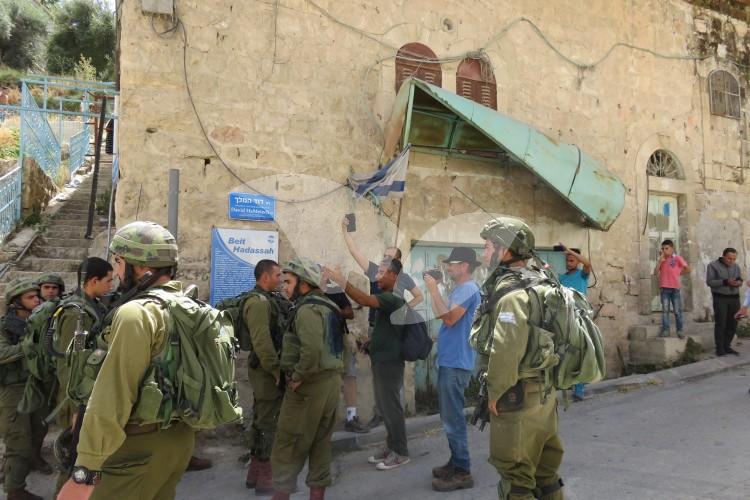 Ta’ayush Activists and IDF Soldiers in Hebron