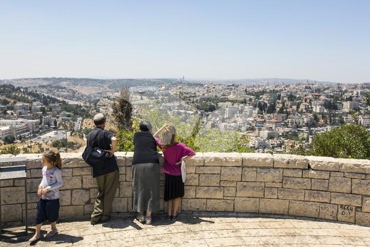 A family at the Mount Scopus Viewpoint