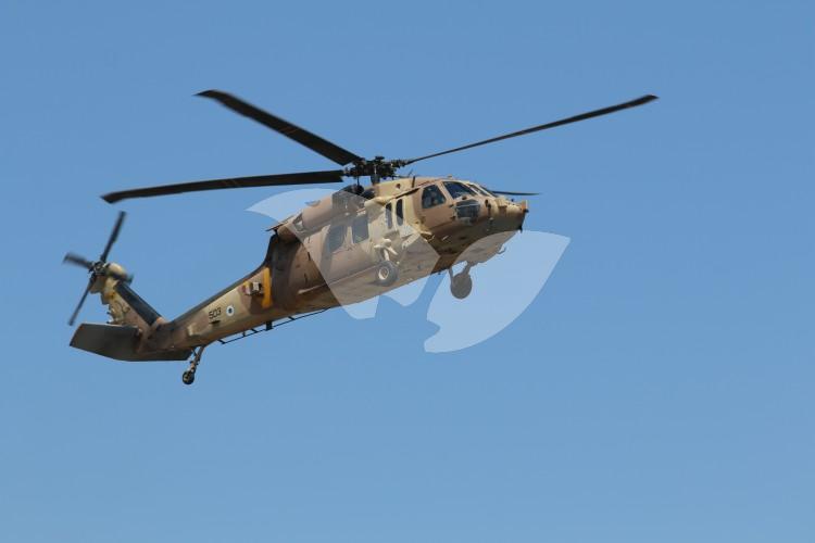 A drill of casualties evacuation by helicopter