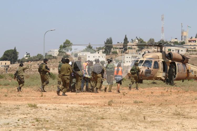 A drill of casualties evacuation by helicopter