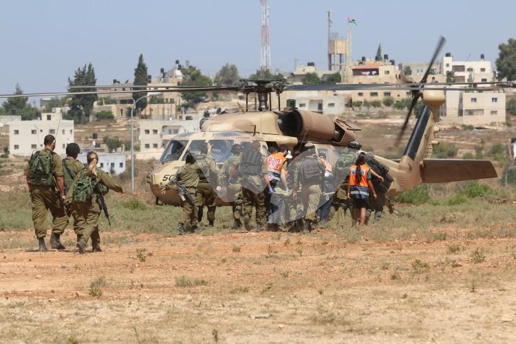 A drill of casualties evacuation by helicopter