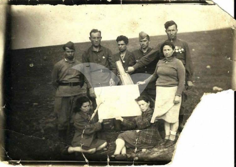 Surviving Jews of Moletai, Lithuania, in 1945 on the Site of the Mass Grave