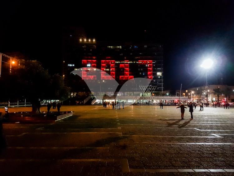 The Tel Aviv municipality building at Rabin Square lights spell Happy New Year in Hebrew