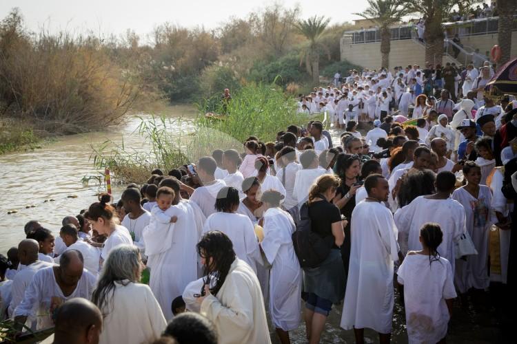 Christian Orthodox pilgrims participate in the baptism of Jesus,