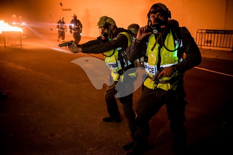 Police, firefighting teams and emergency services train for rescuing hostages from burning bus. Highway 1 Harel Tunnel, Jerusalem