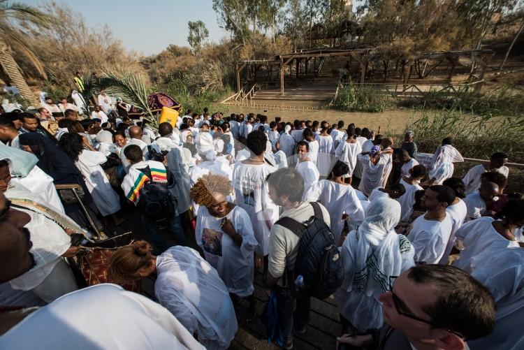 Christian Orthodox pilgrims participate in the baptism of Jesus, during the traditional Epiphany baptism ceremony at the Qasr-el Yahud baptism site in the Jordan river near the West Bank town of Jericho.