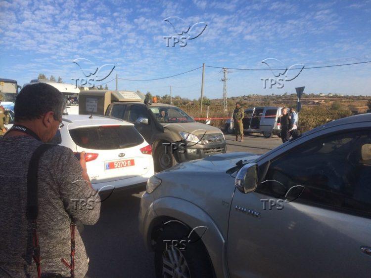 Security forces are seen at the scene of a terrorist attack at Gush Etzion Junction