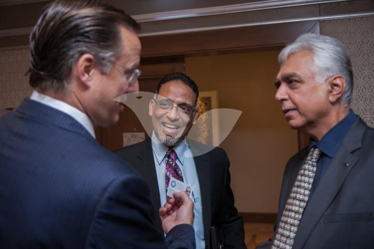 American-Indian investor David Faria (L) and Indian investor Man