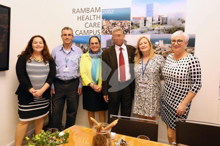M. at a meeting at Rambam Hospital with the hospital staff.