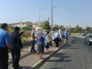 People form a human  chain along the route of the funeral procession for the three murdered members of the Salomon family