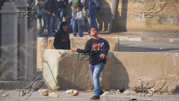 Palestinian youth attacking IDF soldiers