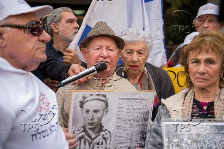 Holocaust survivors protesting