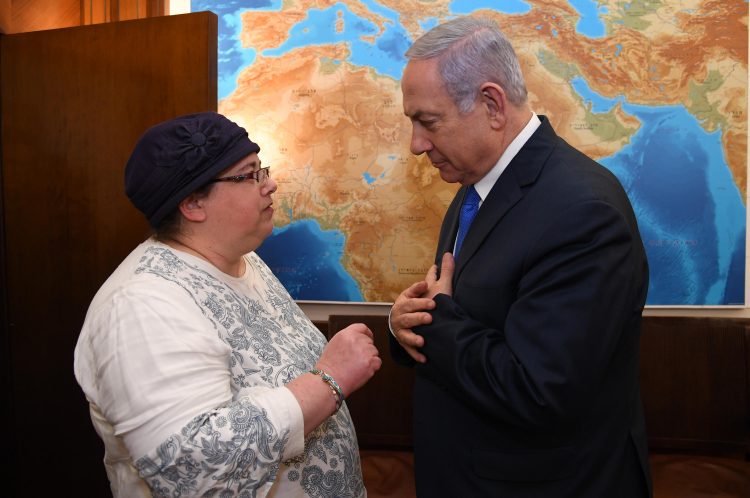PM Netanyahu and Zachary Baumel’s suster, Osnat Haberman