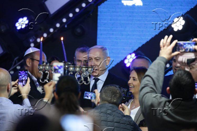 Netanyahu lights the 1st Chanukah candle with political supporters in Jerusalem