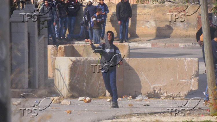 Palestinian youth attacking IDF soldiers