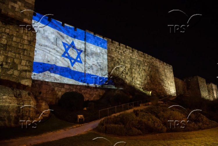 The Israeli flag on the walls of Jerusalem’s Old City