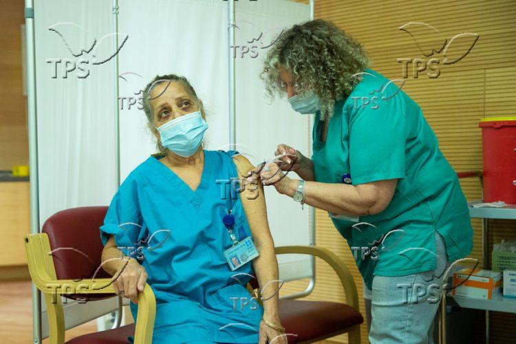 Third COVID-19 vaccine shot at Jerusalem’s Hadassah Ein Kerem hospital