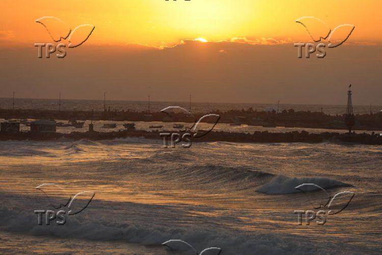Gaza beach during sunset on a stormy day