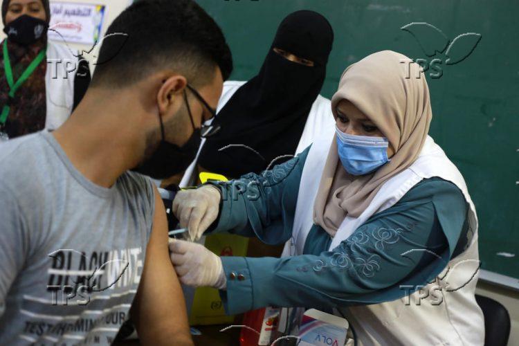 Receiving the Moderna COVID-19 vaccine in Gaza