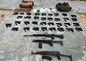 Confiscated weapons and drugs (police picture)