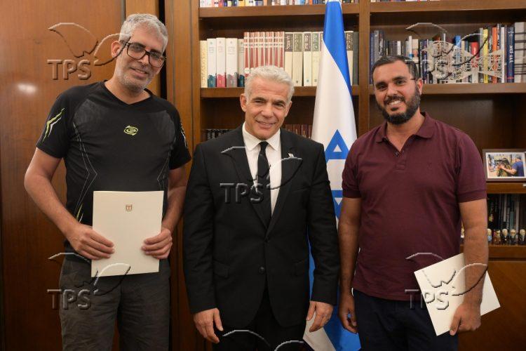 Prime Minister Yair Lapid Meets with Haim Naim and Meshi Ben Ami1
