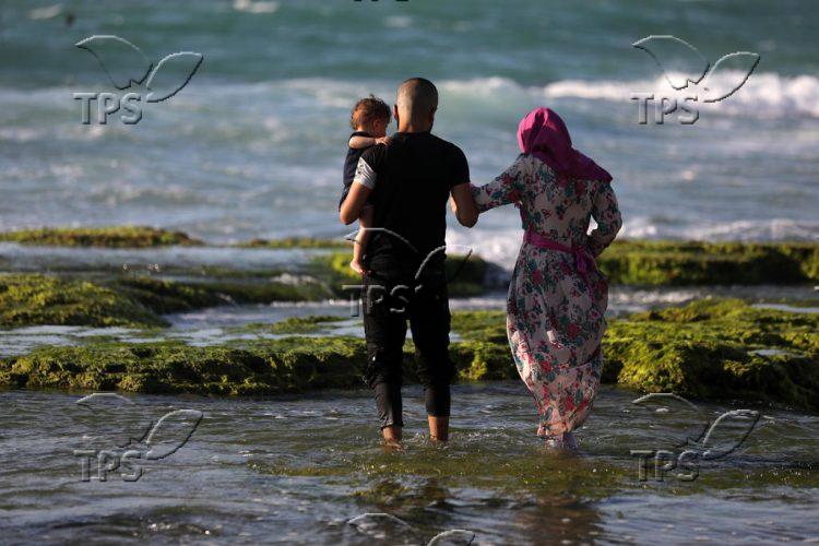 A hot summer day on the beach in Gaza Strip