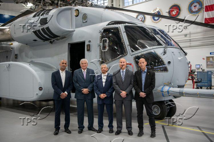Amir Eshel (center) in front of a Sikorsky CH-53E