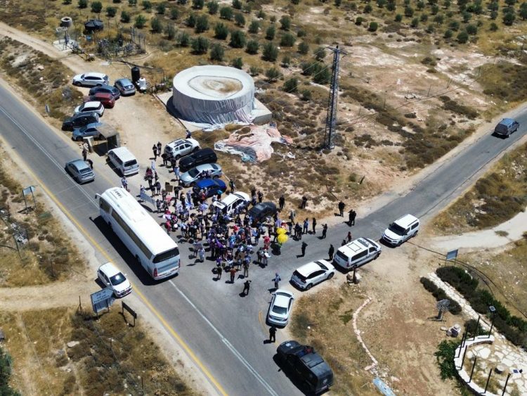 “Peace Now” activists protest against the Jewish settlements in Judea and Samaria