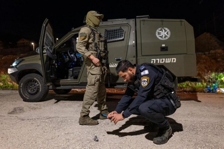 Israeli police saboteurs operate at scenes of falling Iron Dome’s shrapnels