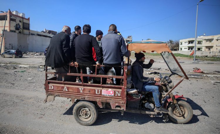 People in Gaza Travel on Salah al-Din Road