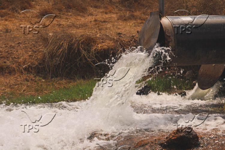 Water flows from a pipe in the Golan Heights