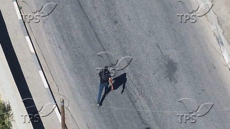 Arson suspect fleeing in the direction of Sinjil